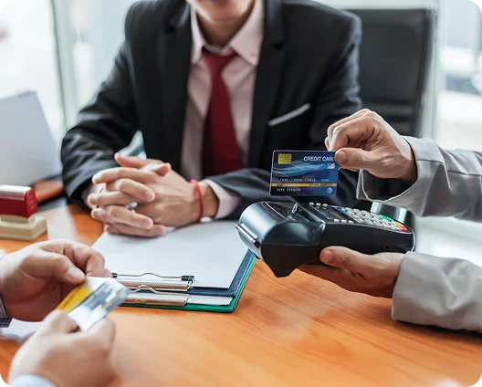 Customer paying by card at a payment terminal, cybersecurity for New York financial services